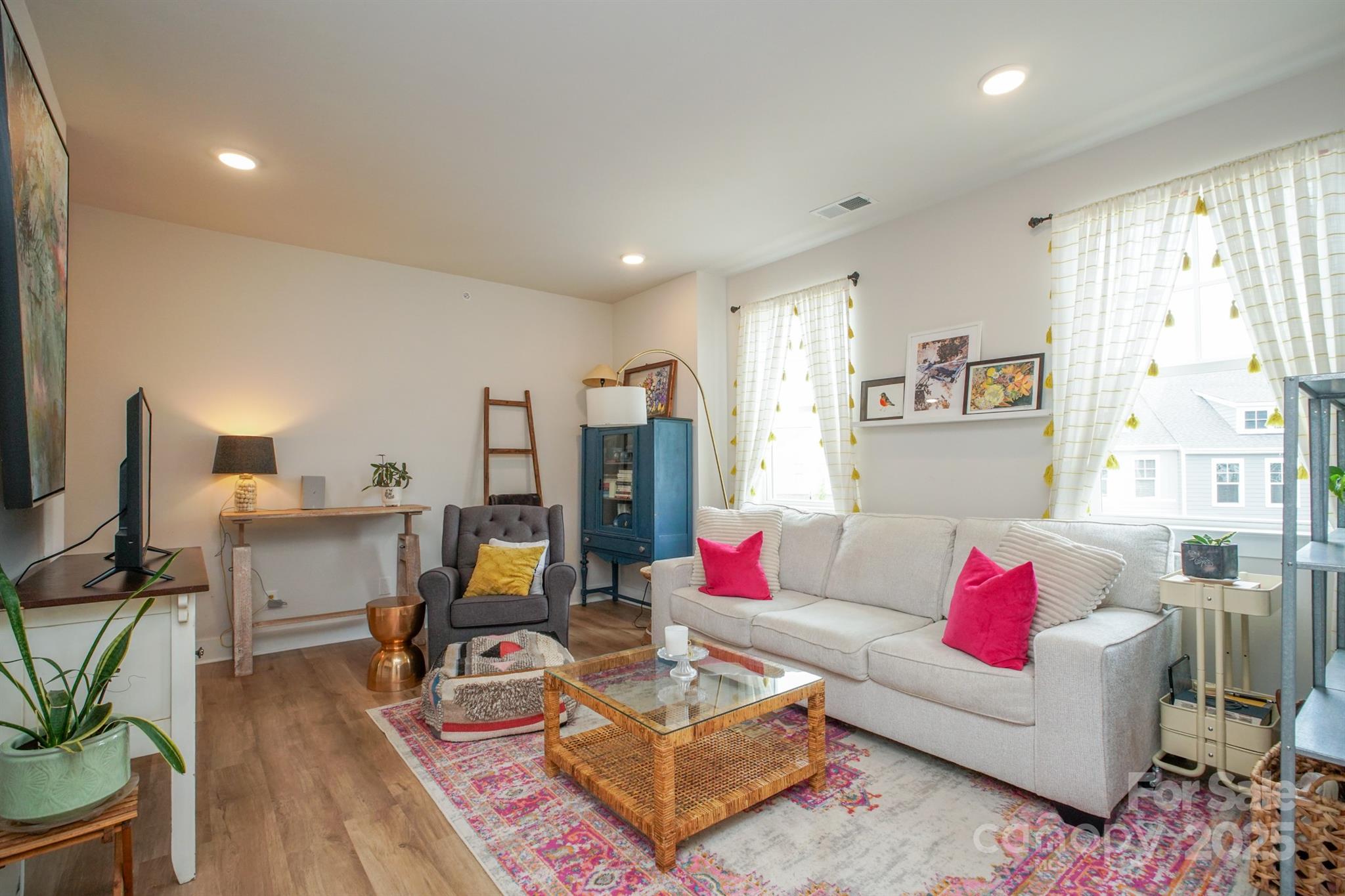 711 Beaty Street Davidson, NC 28036 - Photo 6 of 22 a living room with furniture and wooden floor