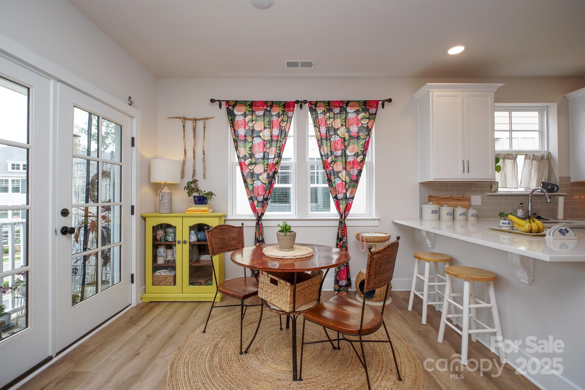 711 Beaty Street Davidson, NC 28036 - Photo 7 of 22 a dining room with furniture and window