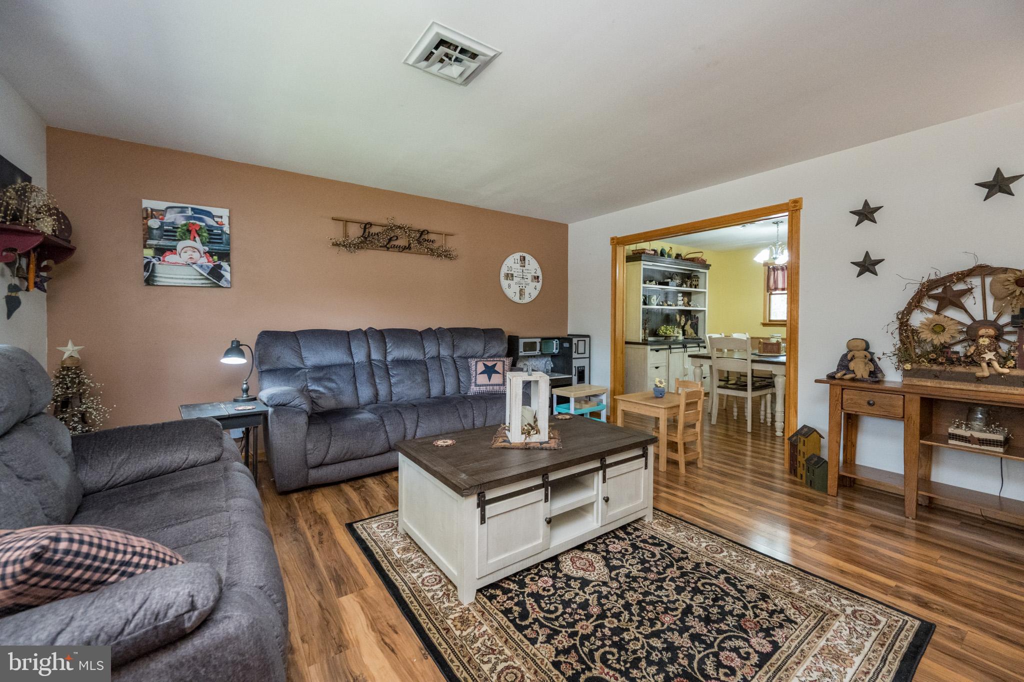 15105 Laurel Ridge Road Southwest Cumberland, MD 21502 - Photo 11 of 54 a living room with furniture and a rug
