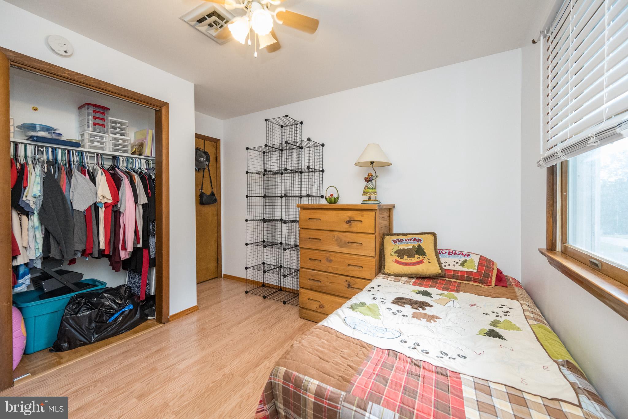 15105 Laurel Ridge Road Southwest Cumberland, MD 21502 - Photo 35 of 54 a bed room with a bed and a closet