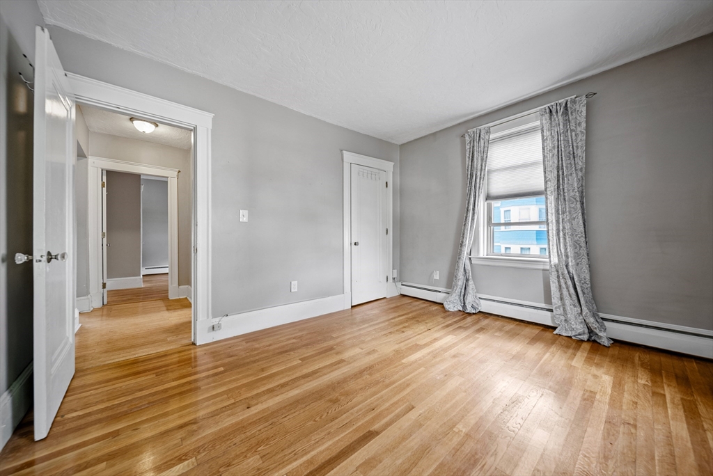 52 High Street, Unit 5 Methuen, MA 01844 - Photo 21 of 32 wooden floor in an empty room with a window