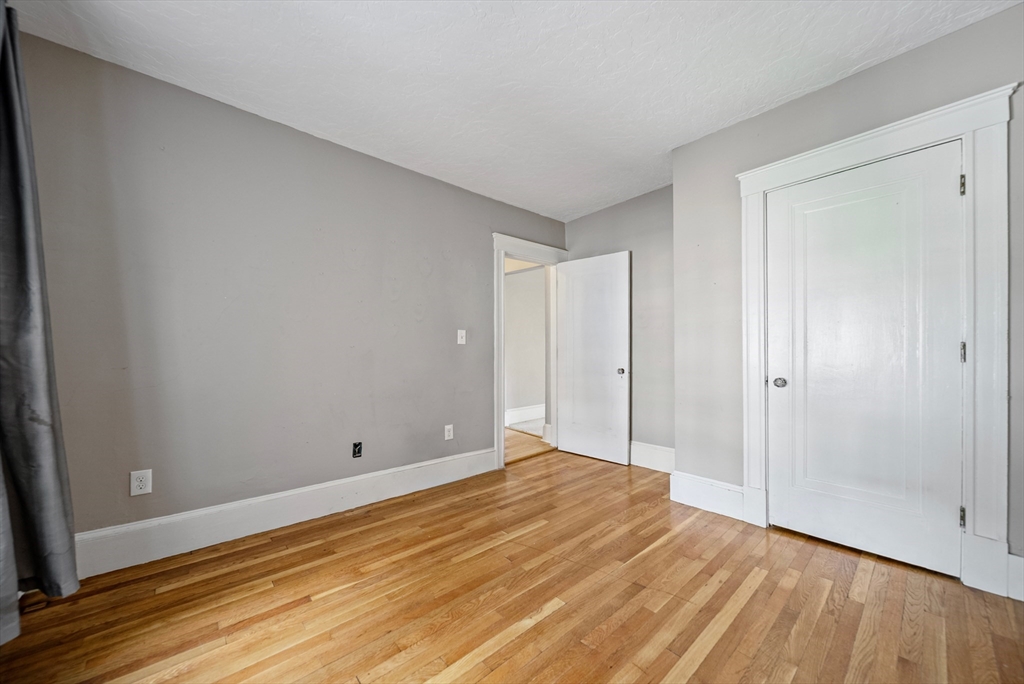 52 High Street, Unit 5 Methuen, MA 01844 - Photo 26 of 32 a view of room with wooden floor