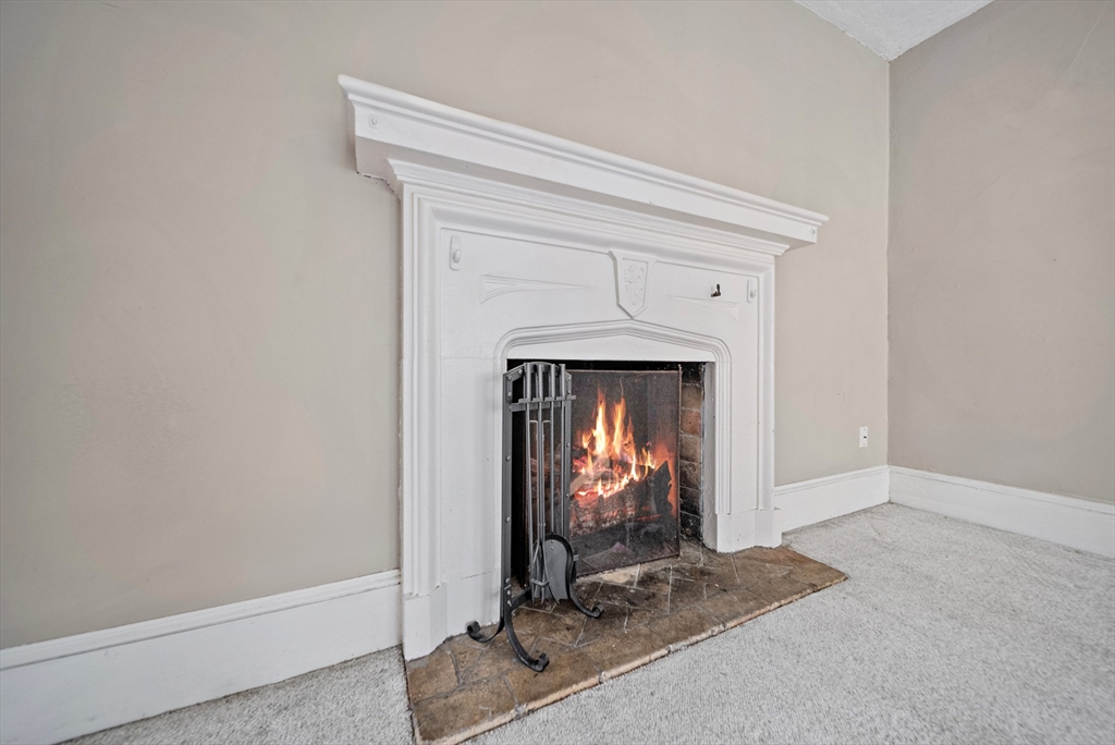 52 High Street, Unit 5 Methuen, MA 01844 - Photo 29 of 32 a view of an empty room with fire place