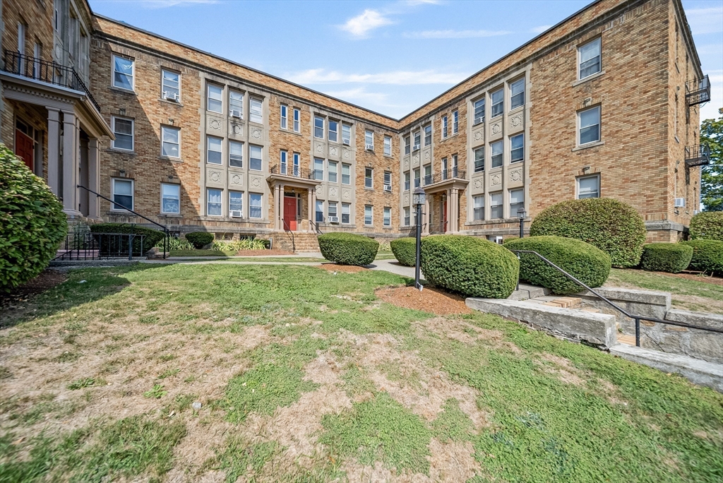 52 High Street, Unit 5 Methuen, MA 01844 - Photo 3 of 32 a view of a building with a yard