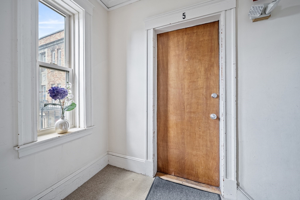 52 High Street, Unit 5 Methuen, MA 01844 - Photo 7 of 32 an empty room with windows and closet