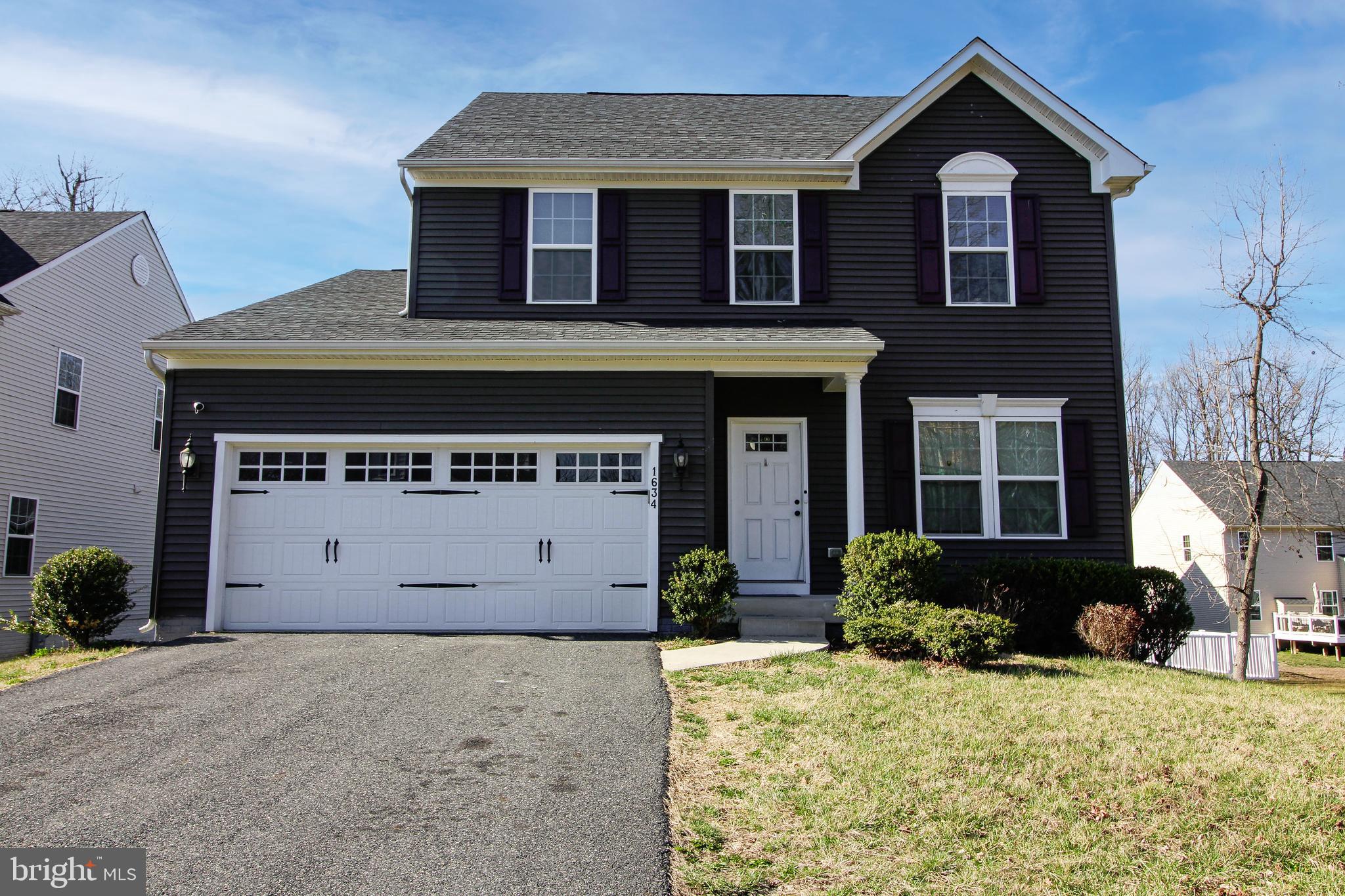 1634 Cape May Road Essex, MD 21221 - Photo 24 of 27 a front view of a house with a yard