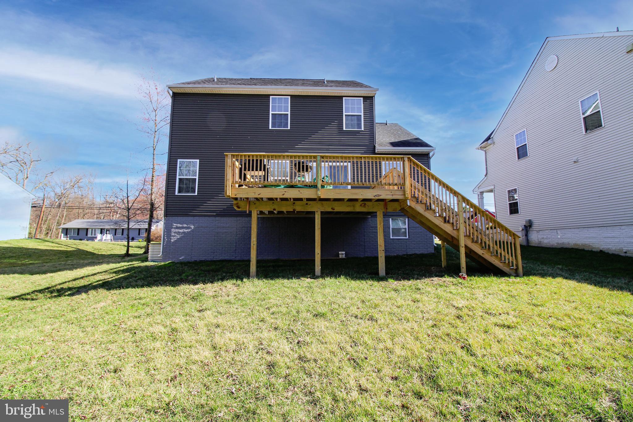 1634 Cape May Road Essex, MD 21221 - Photo 27 of 27 a view of an house with backyard porch and outdoor kitchen