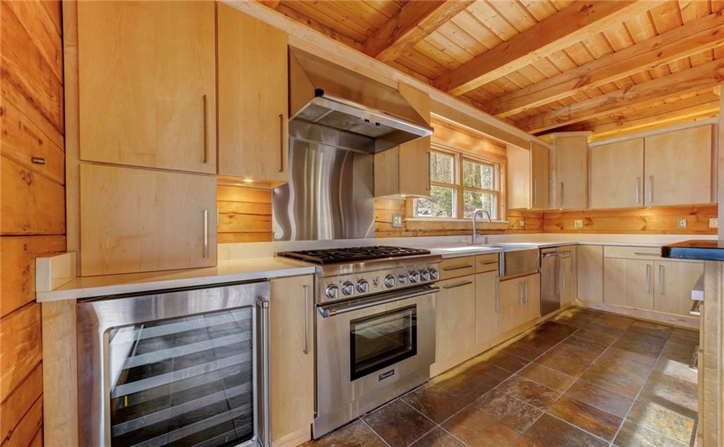 245 Silver Rock Road Adrian, PA 16210 - Photo 16 of 50 a kitchen with a stove oven and sink