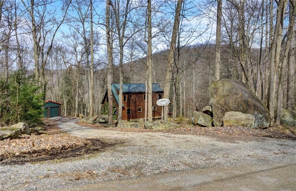 245 Silver Rock Road Adrian, PA 16210 - Photo 2 of 50 a view of house with trees in the background