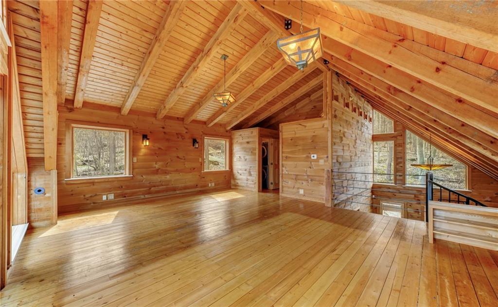 245 Silver Rock Road Adrian, PA 16210 - Photo 25 of 50 a view of empty room with wooden floor and fan