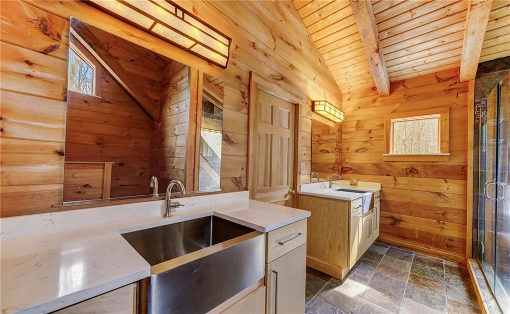 245 Silver Rock Road Adrian, PA 16210 - Photo 27 of 50 a kitchen with a sink and a stove top oven