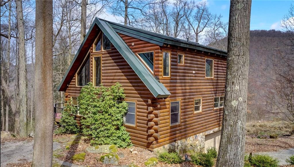 245 Silver Rock Road Adrian, PA 16210 - Photo 3 of 50 a backyard of a house with lots of green space