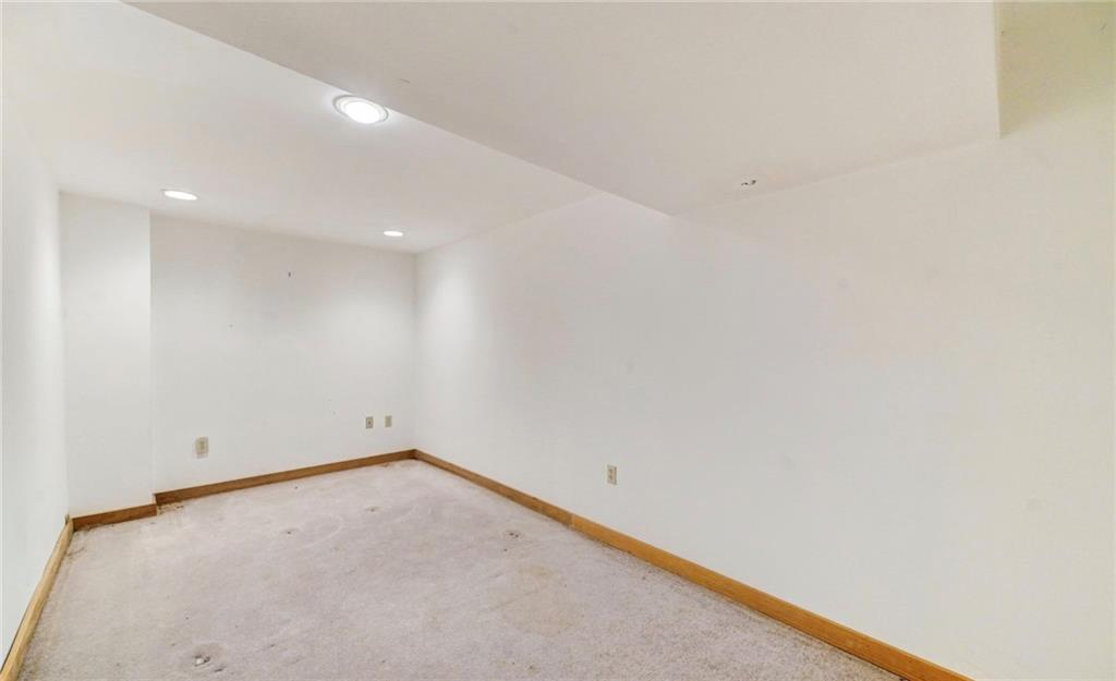 245 Silver Rock Road Adrian, PA 16210 - Photo 32 of 50 an empty room with a workbench