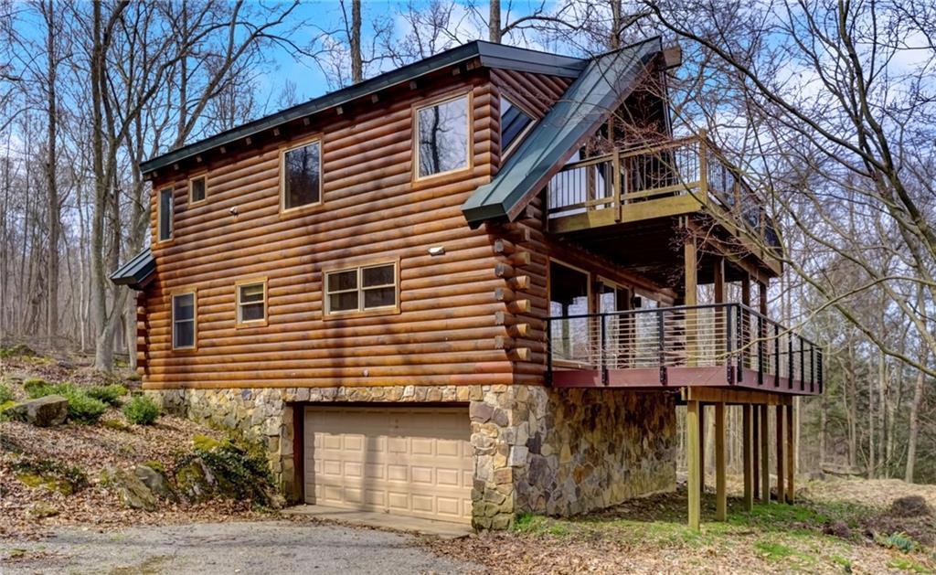 245 Silver Rock Road Adrian, PA 16210 - Photo 34 of 50 a front view of a house with a yard