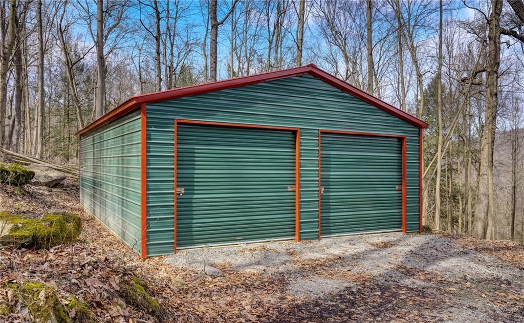 245 Silver Rock Road Adrian, PA 16210 - Photo 41 of 50 a backyard of a house