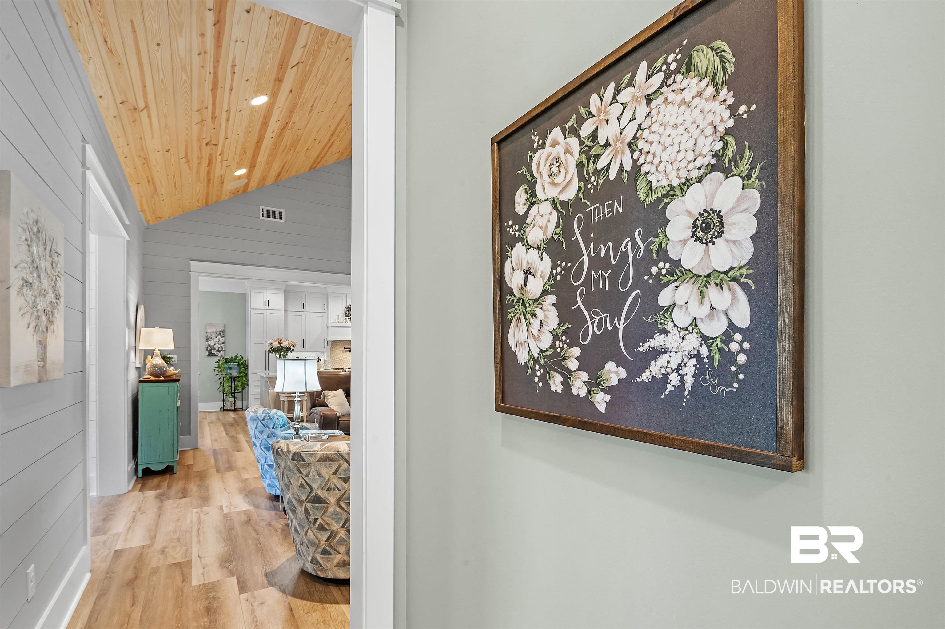 9144 Harvest Ridge Fairhope, AL 36532 - Photo 27 of 58 Hallway with wooden walls, wood finished floors, recessed lighting, lofted ceiling, and wood ceiling