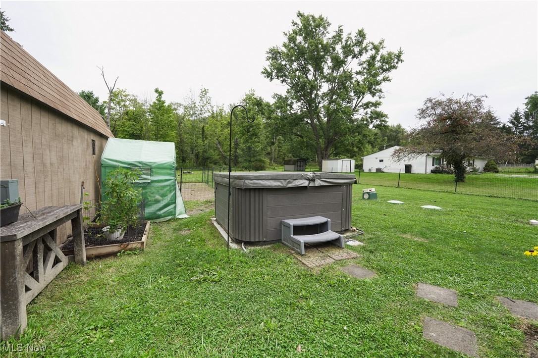 4099 Beach Road Medina, OH 44256 - Photo 15 of 46 View of backyard featuring a hot tub