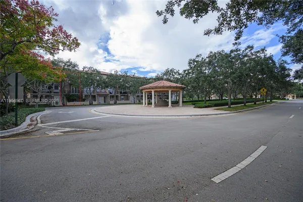 a view of house with outdoor space and street view