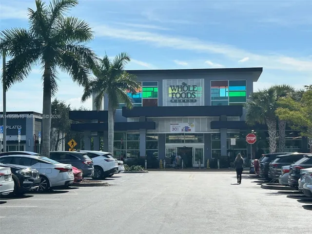 a view of street with parked cars