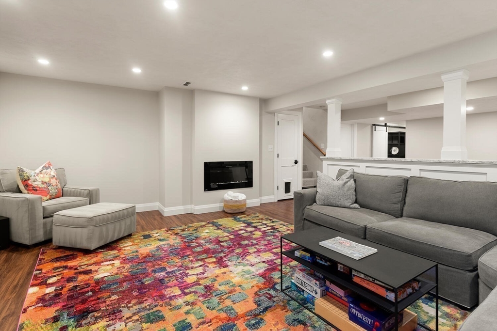 19 Edmonds Road Concord, MA 01742 - Photo 19 of 24 a living room with furniture and a flat screen tv