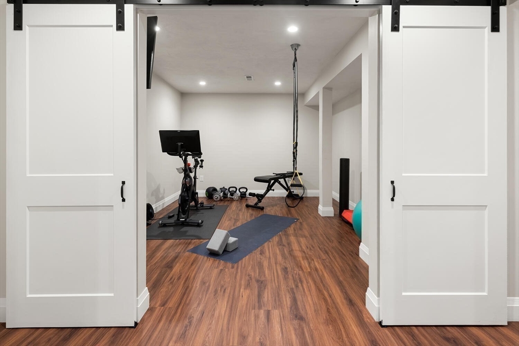 19 Edmonds Road Concord, MA 01742 - Photo 20 of 24 a view of a room with wooden floor