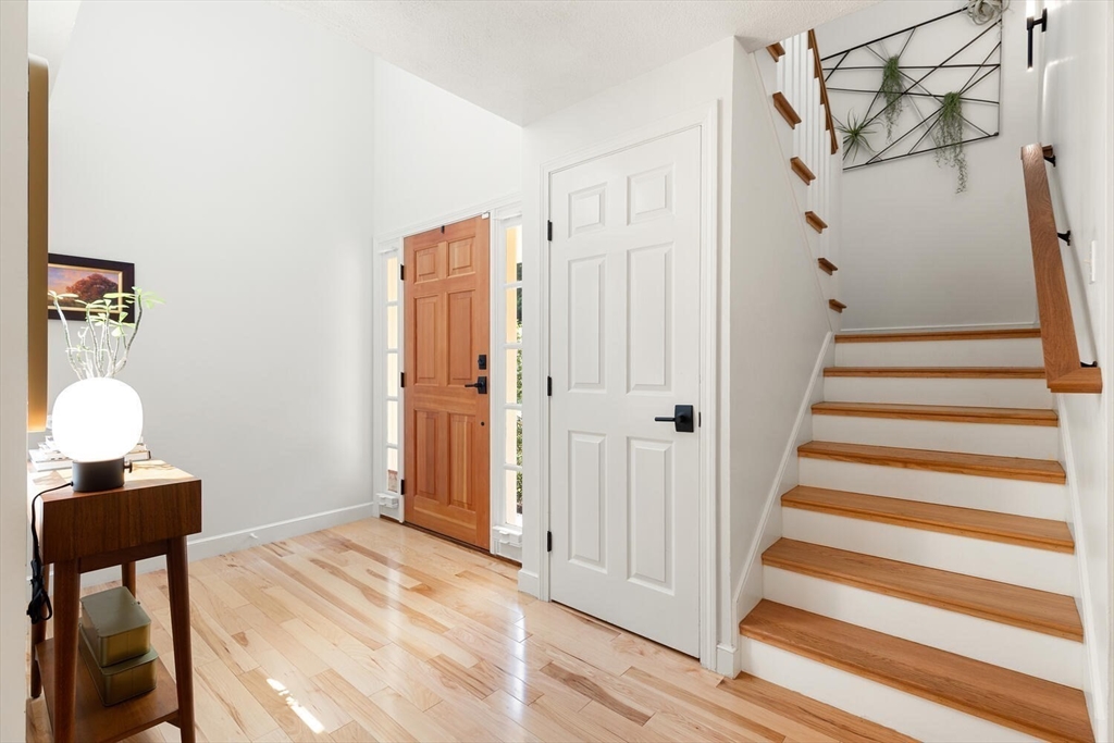 19 Edmonds Road Concord, MA 01742 - Photo 3 of 24 a view of a hallway with front door