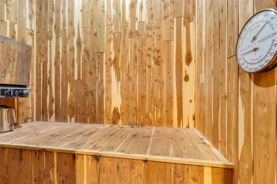 24102 Northcrest Drive Spring, TX 77389 - Photo 13 of 30 Indulge in ultimate relaxation with a luxurious dry sauna seamlessly connected to the primary suite, offering a private retreat within your home.