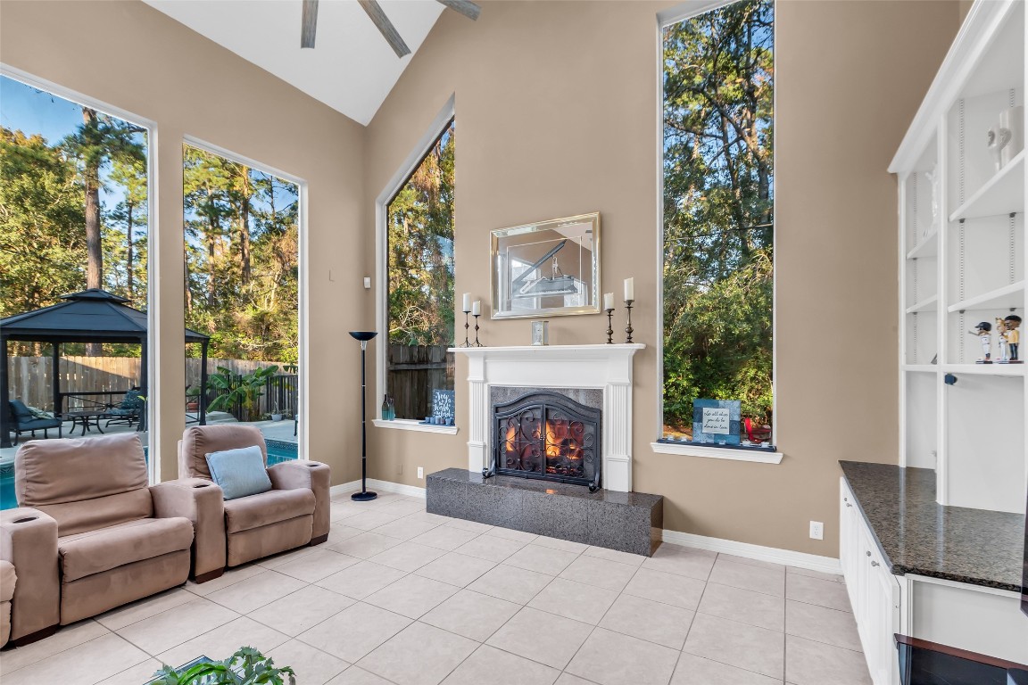 24102 Northcrest Drive Spring, TX 77389 - Photo 20 of 30 a living room with furniture and a fireplace