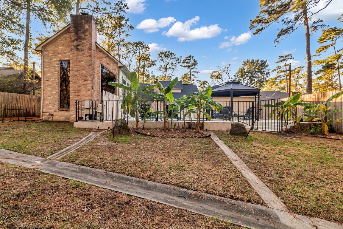 24102 Northcrest Drive Spring, TX 77389 - Photo 29 of 30 This charming home boasts a private backyard oasis, perfect for relaxation and outdoor gatherings.