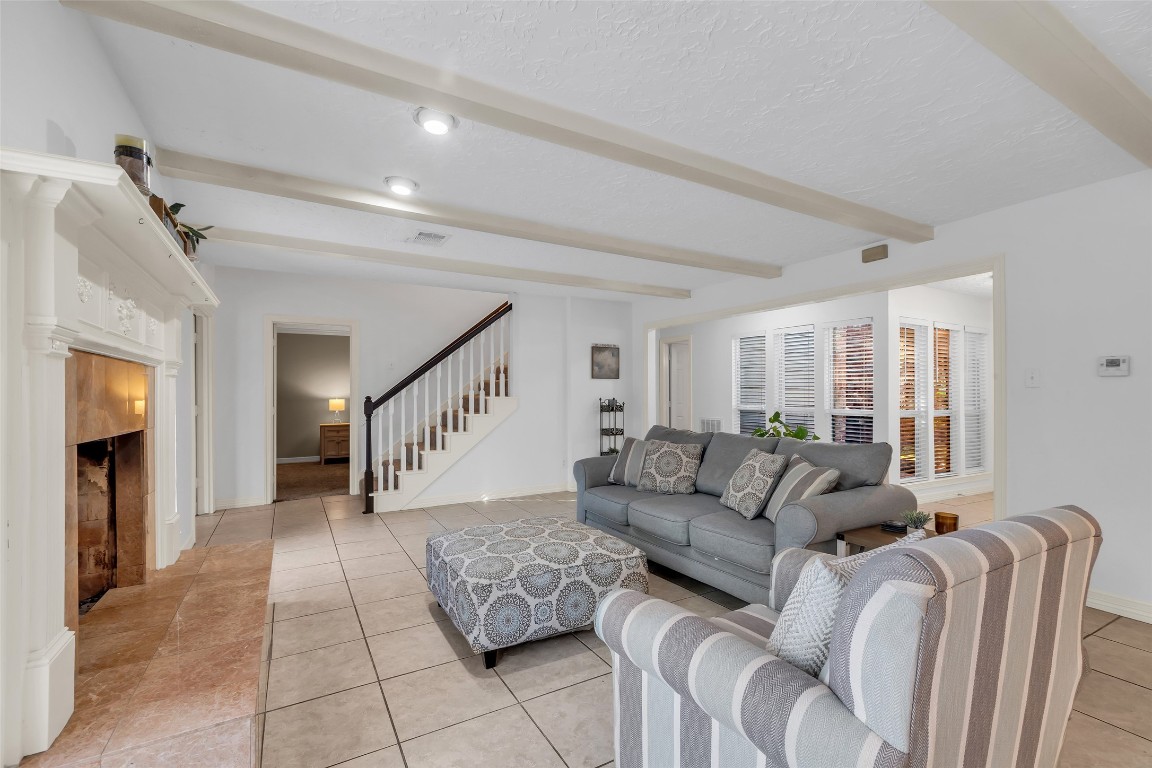 24102 Northcrest Drive Spring, TX 77389 - Photo 3 of 30 a living room with furniture and a ceiling fan