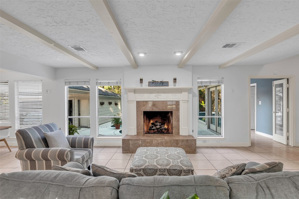 24102 Northcrest Drive Spring, TX 77389 - Photo 5 of 30 a living room with furniture and a fireplace