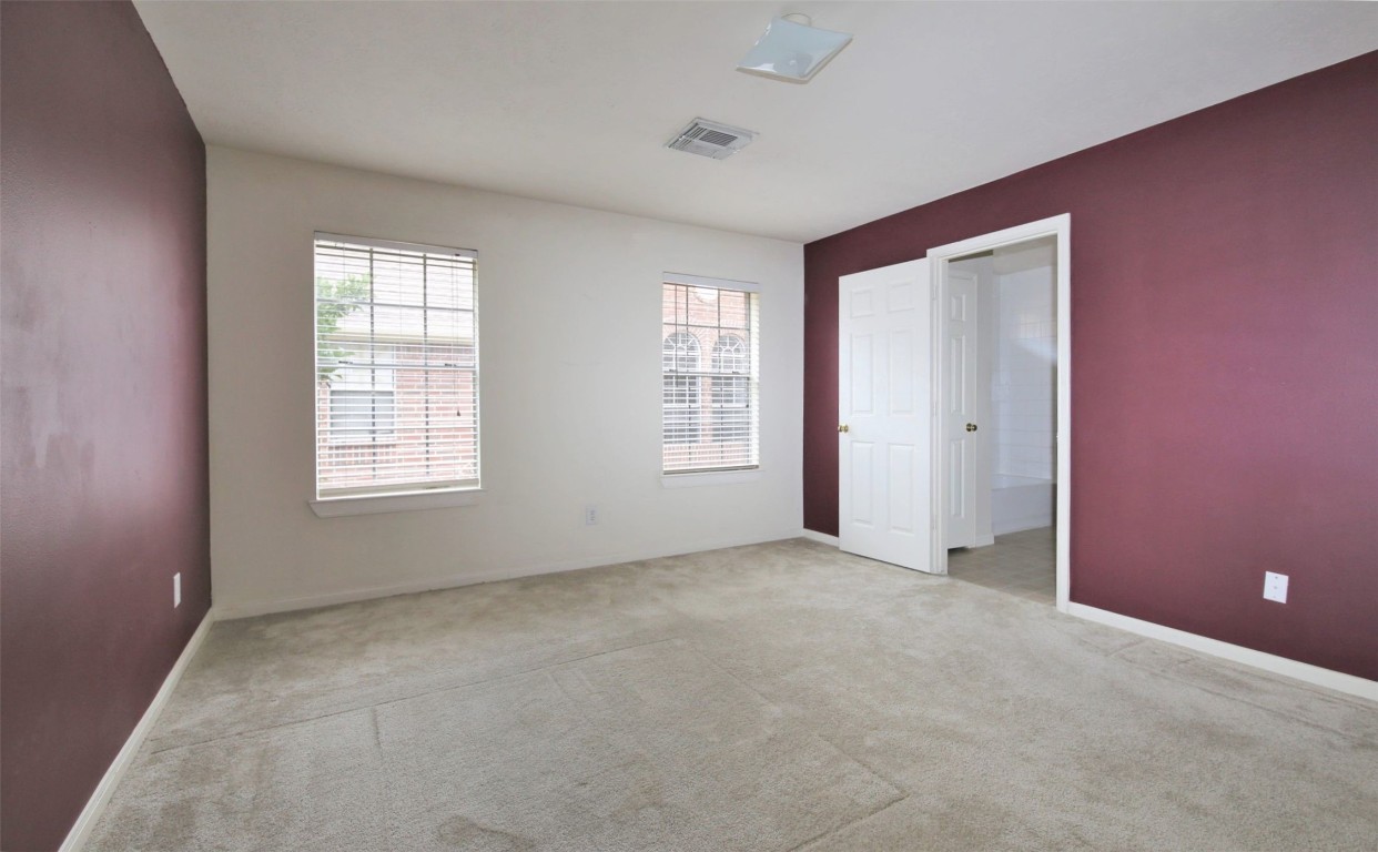 11735 Alief Clodine Road, Unit 22 Houston, TX 77072 - Photo 11 of 23 a view of an empty room with a window