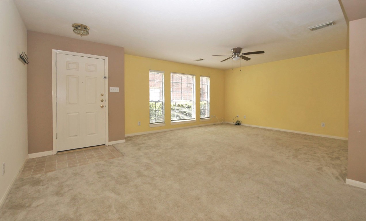 11735 Alief Clodine Road, Unit 22 Houston, TX 77072 - Photo 2 of 23 a view of an empty room with a window