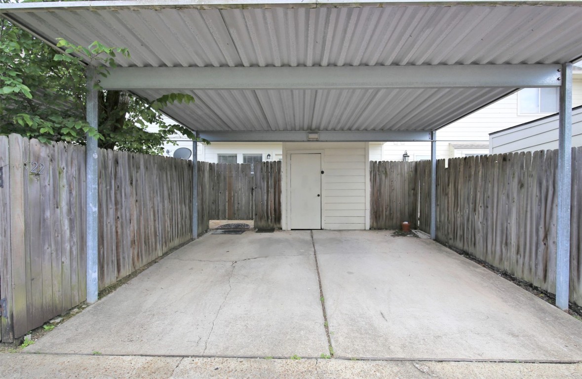 11735 Alief Clodine Road, Unit 22 Houston, TX 77072 - Photo 22 of 23 a view of backyard with wooden fence