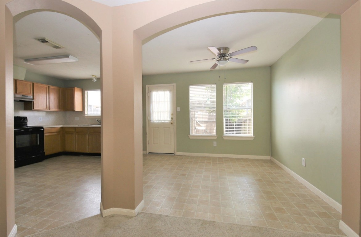 11735 Alief Clodine Road, Unit 22 Houston, TX 77072 - Photo 5 of 23 a view of an empty room with window and cabinet