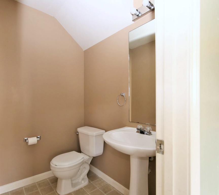 11735 Alief Clodine Road, Unit 22 Houston, TX 77072 - Photo 9 of 23 a bathroom with a sink and a toilet