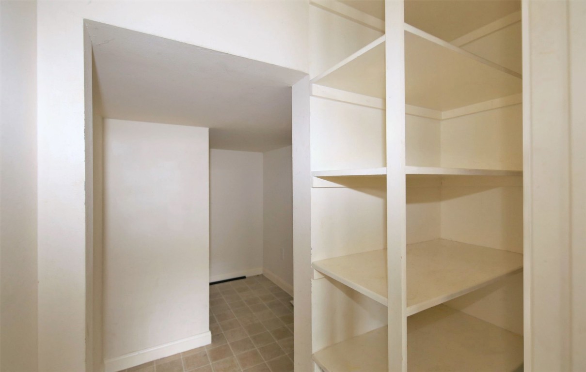 11735 Alief Clodine Road, Unit 22 Houston, TX 77072 - Photo 10 of 23 a view of an empty walk in closet