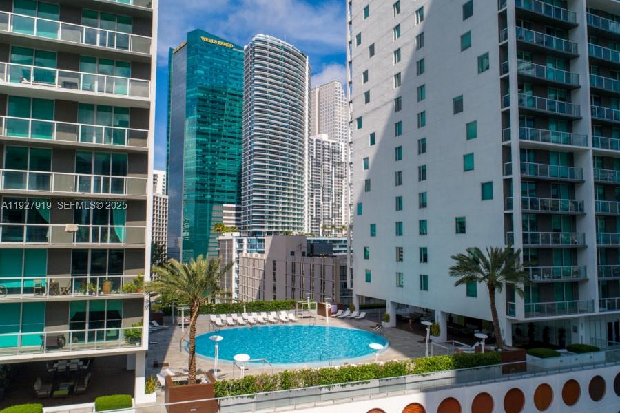 55 Southeast 6th Street, Unit 4103 Miami, FL 33131 - Photo 19 of 24 a view of tall buildings and a swimming pool