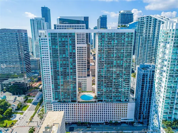 a view of a city with tall buildings