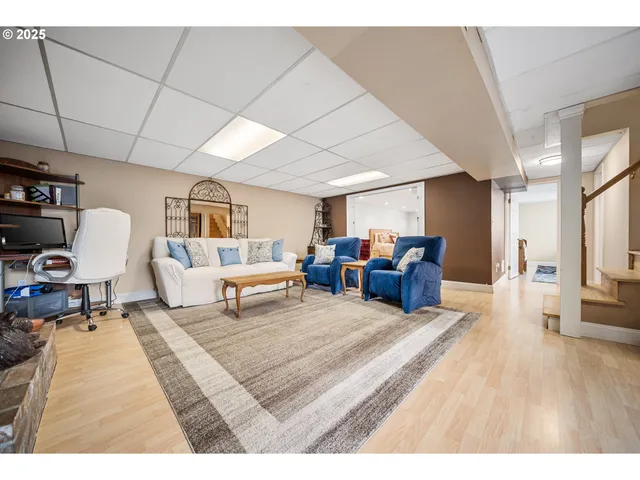 a living room with furniture and a table