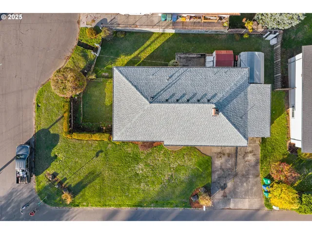a aerial view of a house with a garden