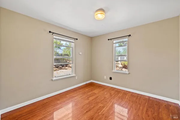an empty room with windows