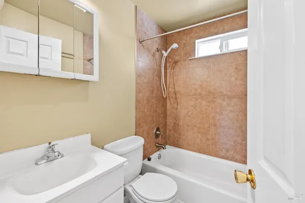 a bathroom with a sink and a bathtub