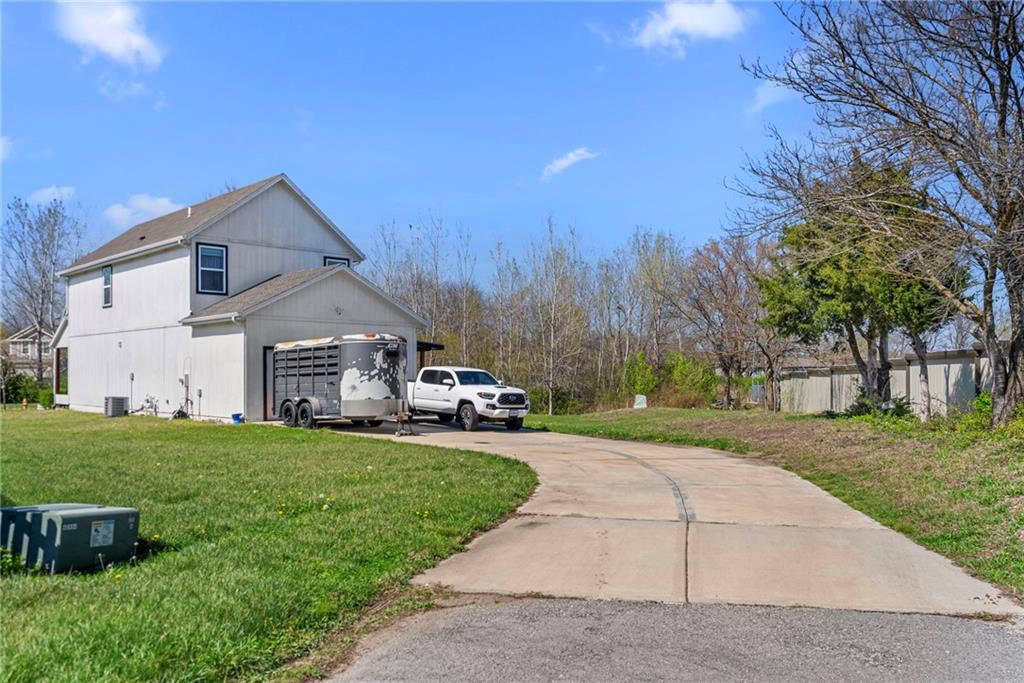 231 Jenny Lane Raymore, MO 64083 - Photo 2 of 29