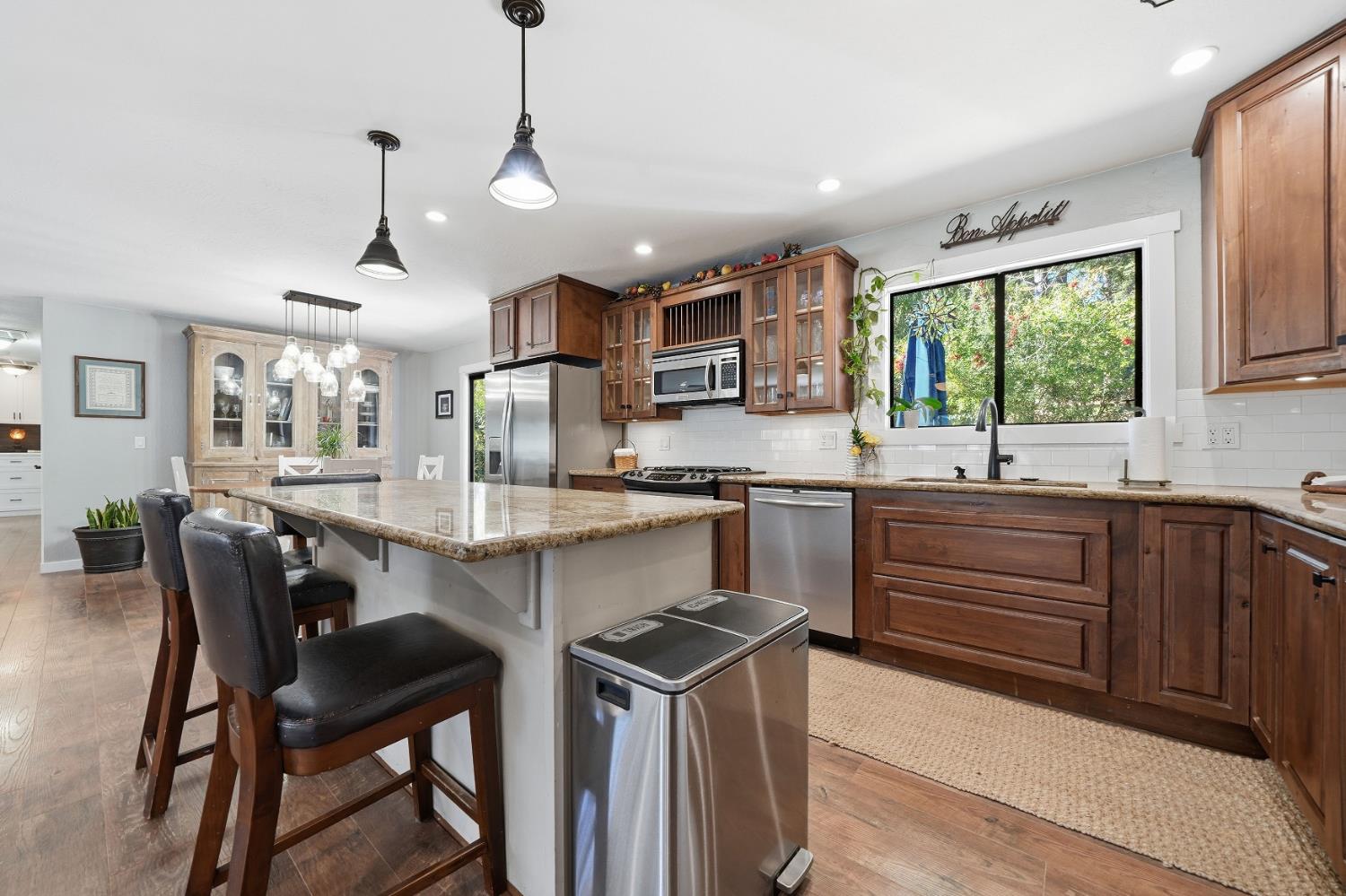 10376 Tabeaud Road Pine Grove, CA 95665 - Photo 21 of 70 Kitchen cabinets are Knotty Alder, many extras inside cabinets