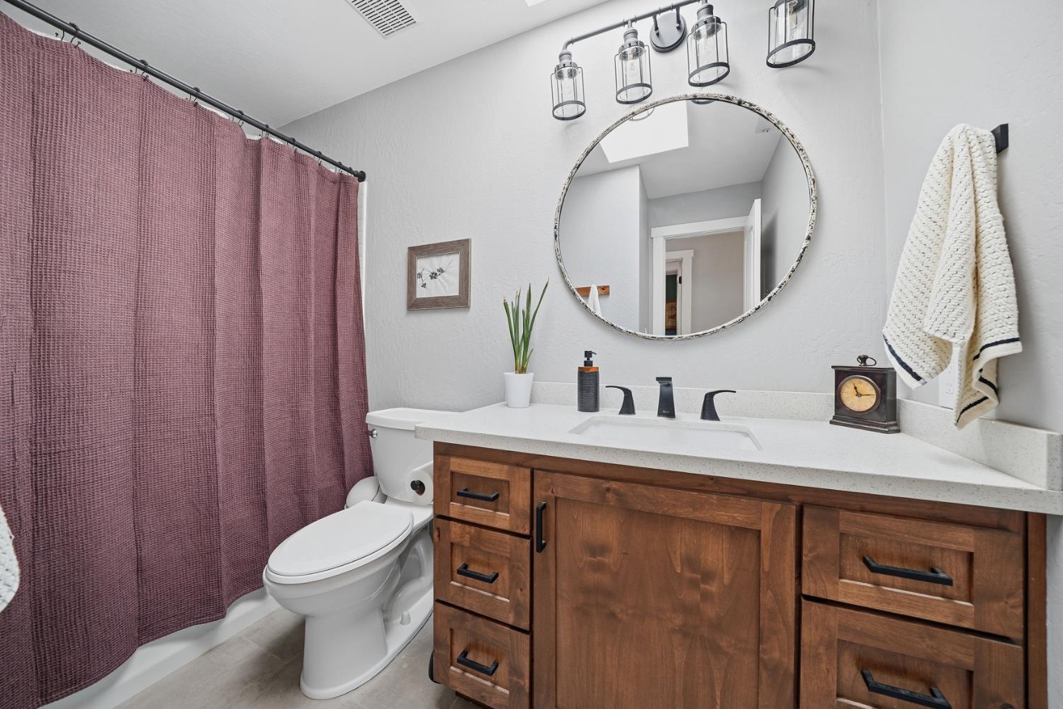 10376 Tabeaud Road Pine Grove, CA 95665 - Photo 43 of 70 1st full guest bathroom, custom Alder cabinets, quartz counter