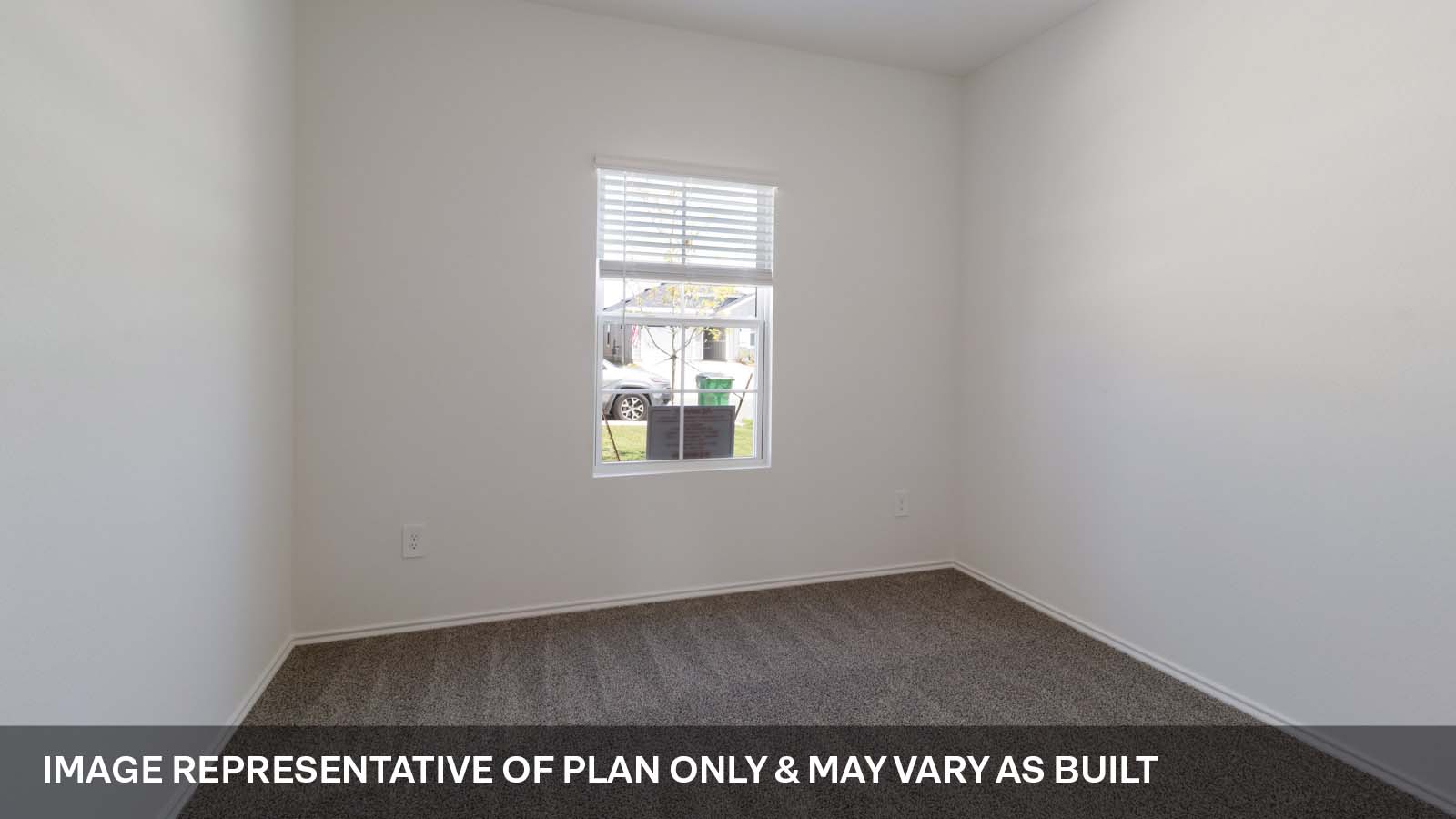 1181 Celosia Loop Kyle, TX 78640 - Photo 9 of 17 an empty room with a window
