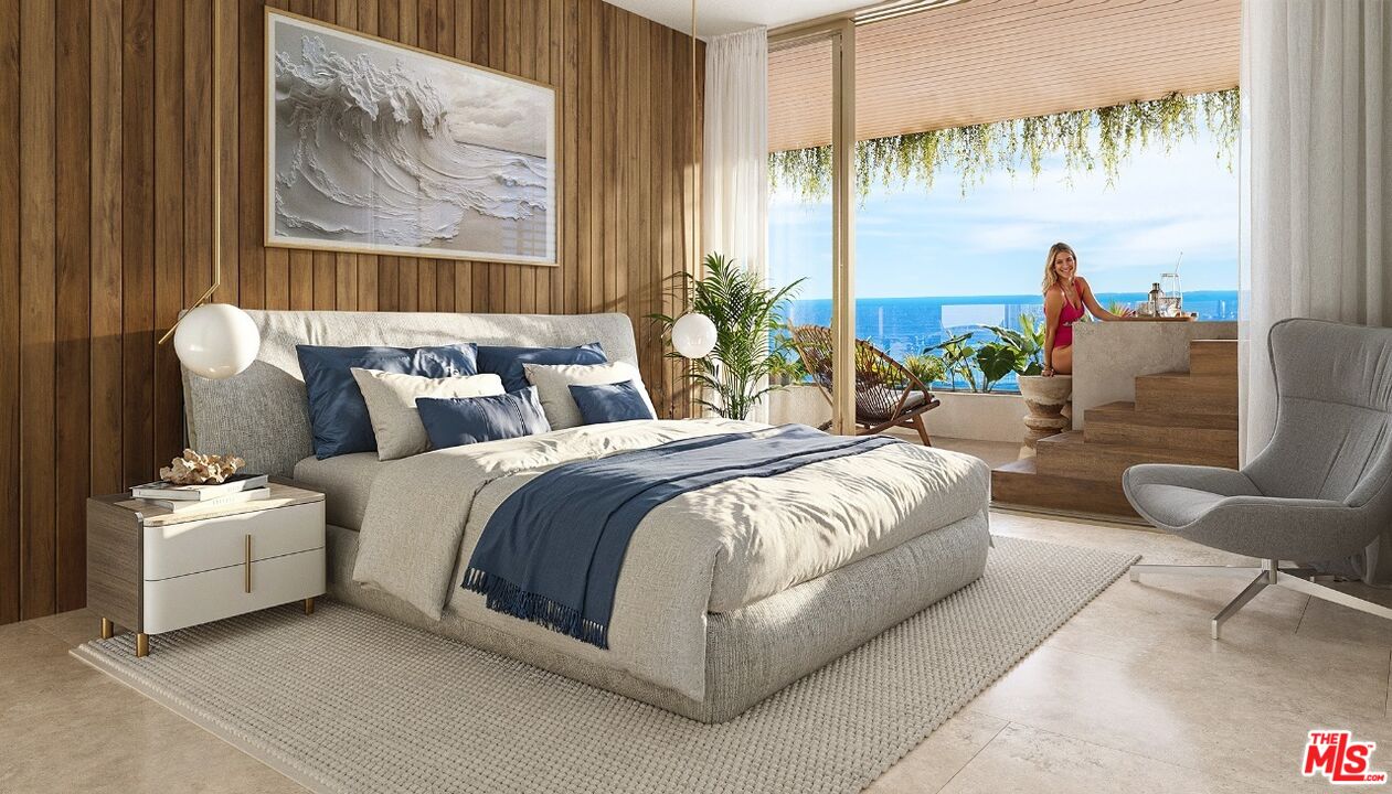 703 Ocean Studio Costa Rica Other, XX 0 - Photo 3 of 11 a spacious bedroom with a bed and a painting on the wall