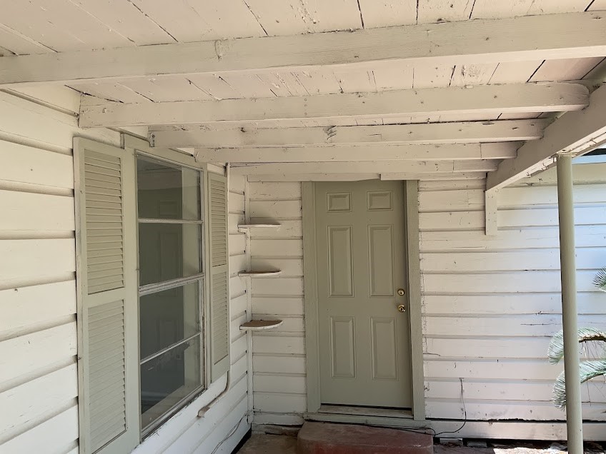 1329 Adams Road Bay City, TX 77414 - Photo 2 of 14 a view of wooden door
