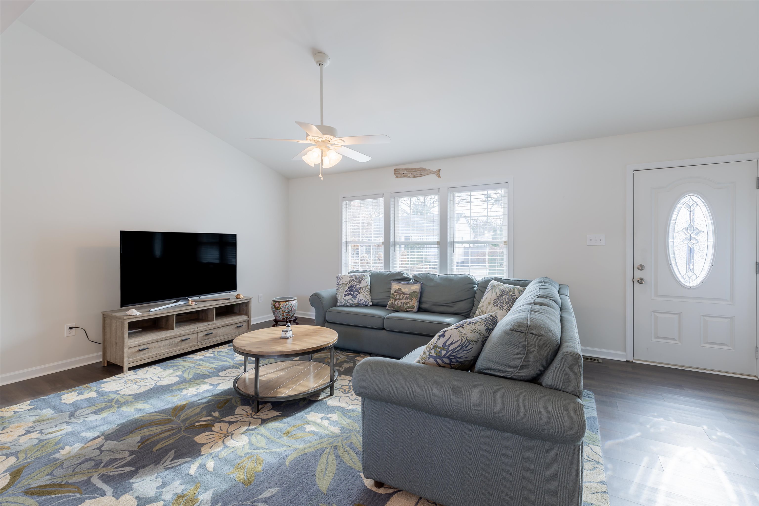 103 Avalon Road Cape May, NJ 08204 - Photo 3 of 33 a living room with furniture and a flat screen tv